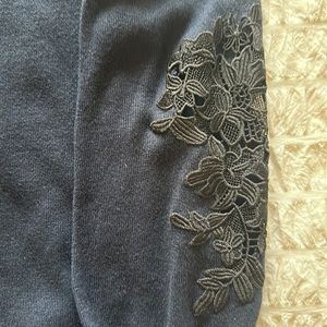 Loft sweater with lace/embroidery detail on bottom half of sleeves.